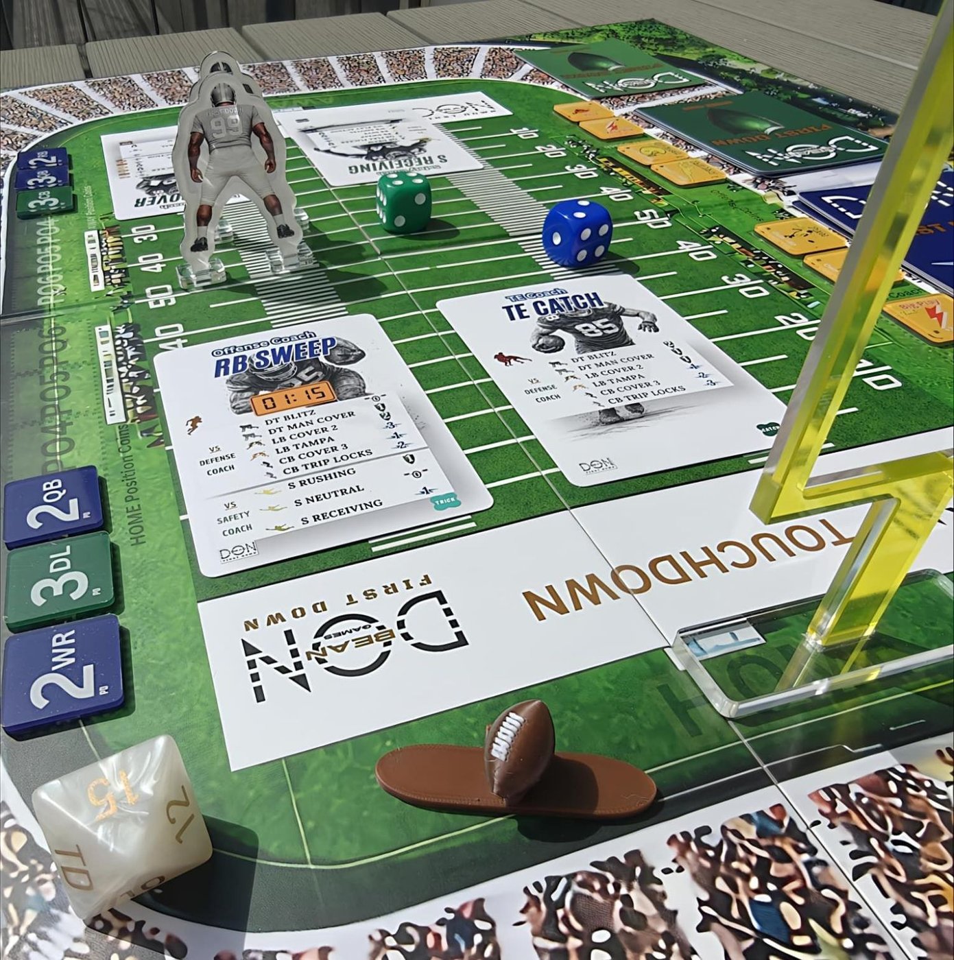 FIRST DOWN tactical football board game set up on a table with cards, tokens, dice and player figures